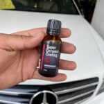 Super Ceramic Coating 9H DIY kit being applied on car paint surface