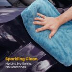 Blue 1200 GSM microfiber towel being used to dry car after wash