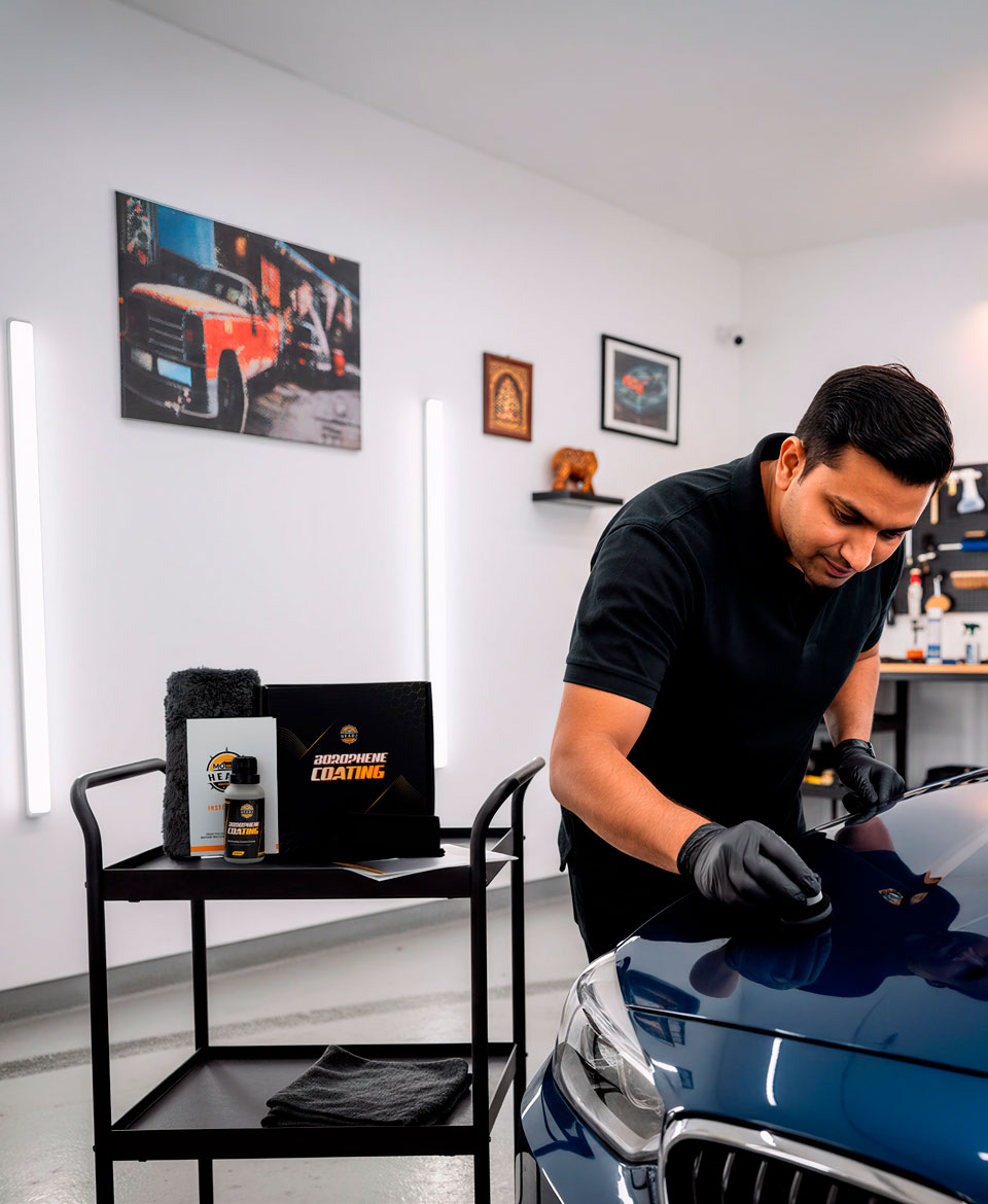 Professional car detailing with super ceramic coating for superior protection and shine.